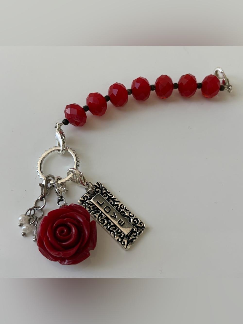 Glass bead love ❤️🌹 charm for bag or whatever. New condition, easy lobster claws